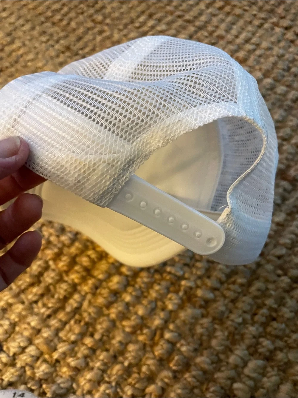 White Trucker Hat with Green Script Accent